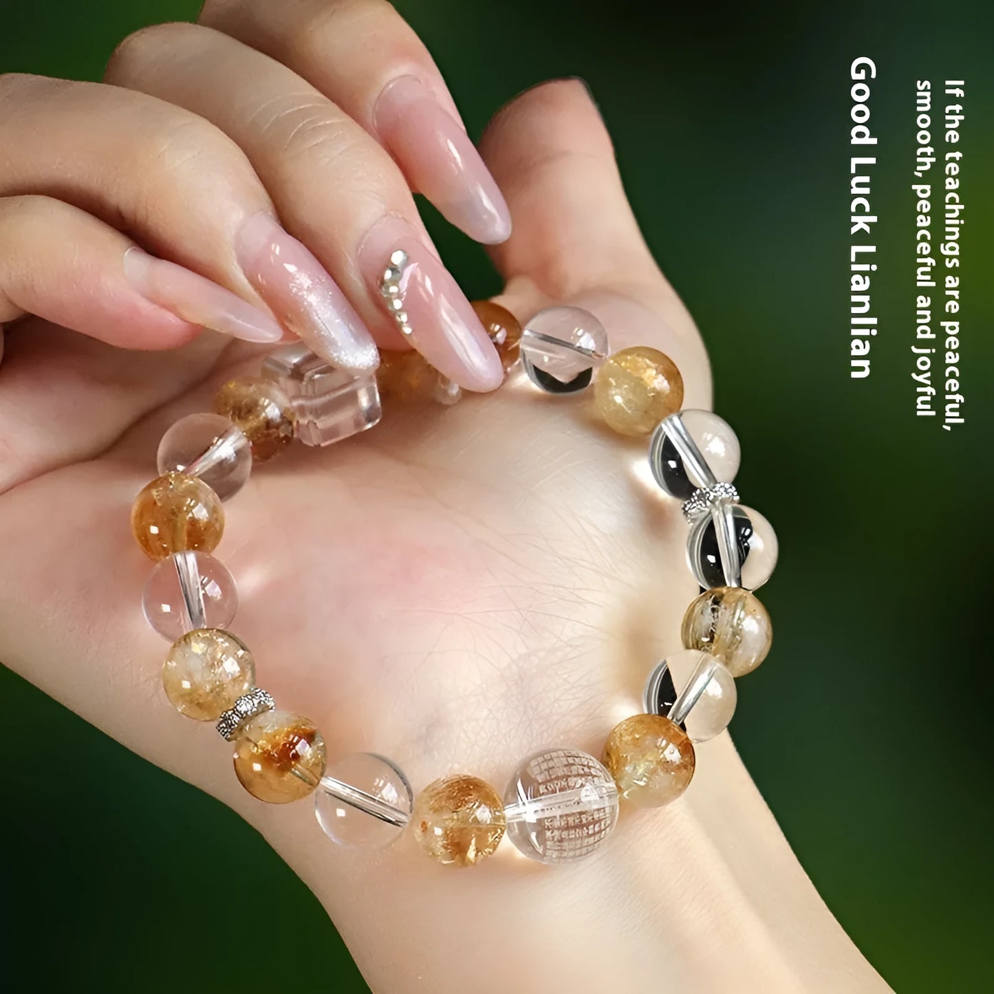 Handmade women's crystal beaded bracelet with freshwater pearls and small Buddha charm