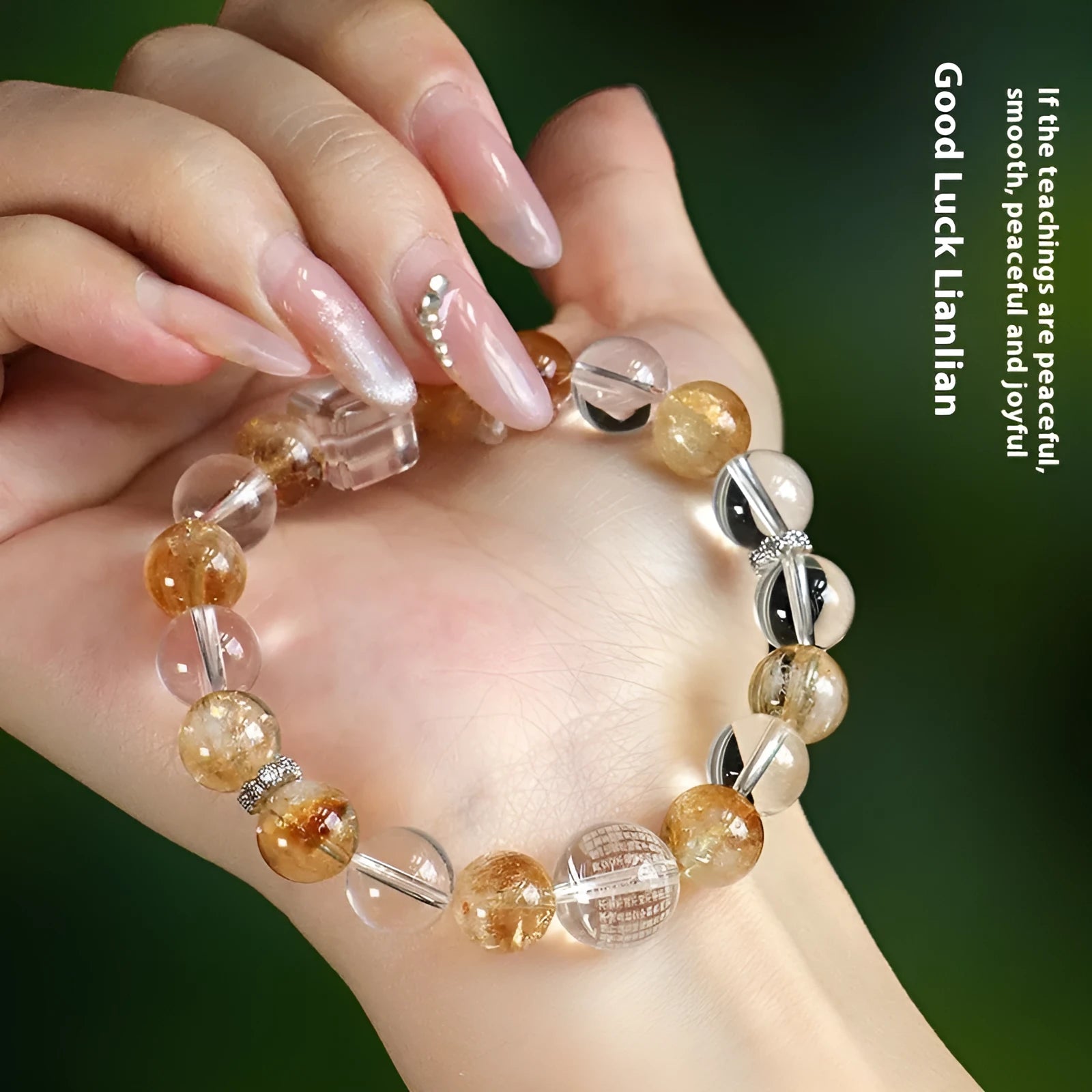 Handmade women's crystal beaded bracelet with freshwater pearls and small Buddha charm