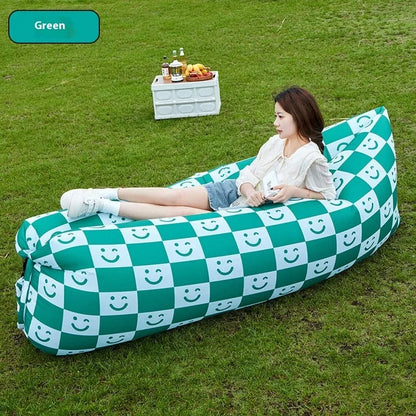 Yellow smiling face pattern inflatable portable seat for outdoor use