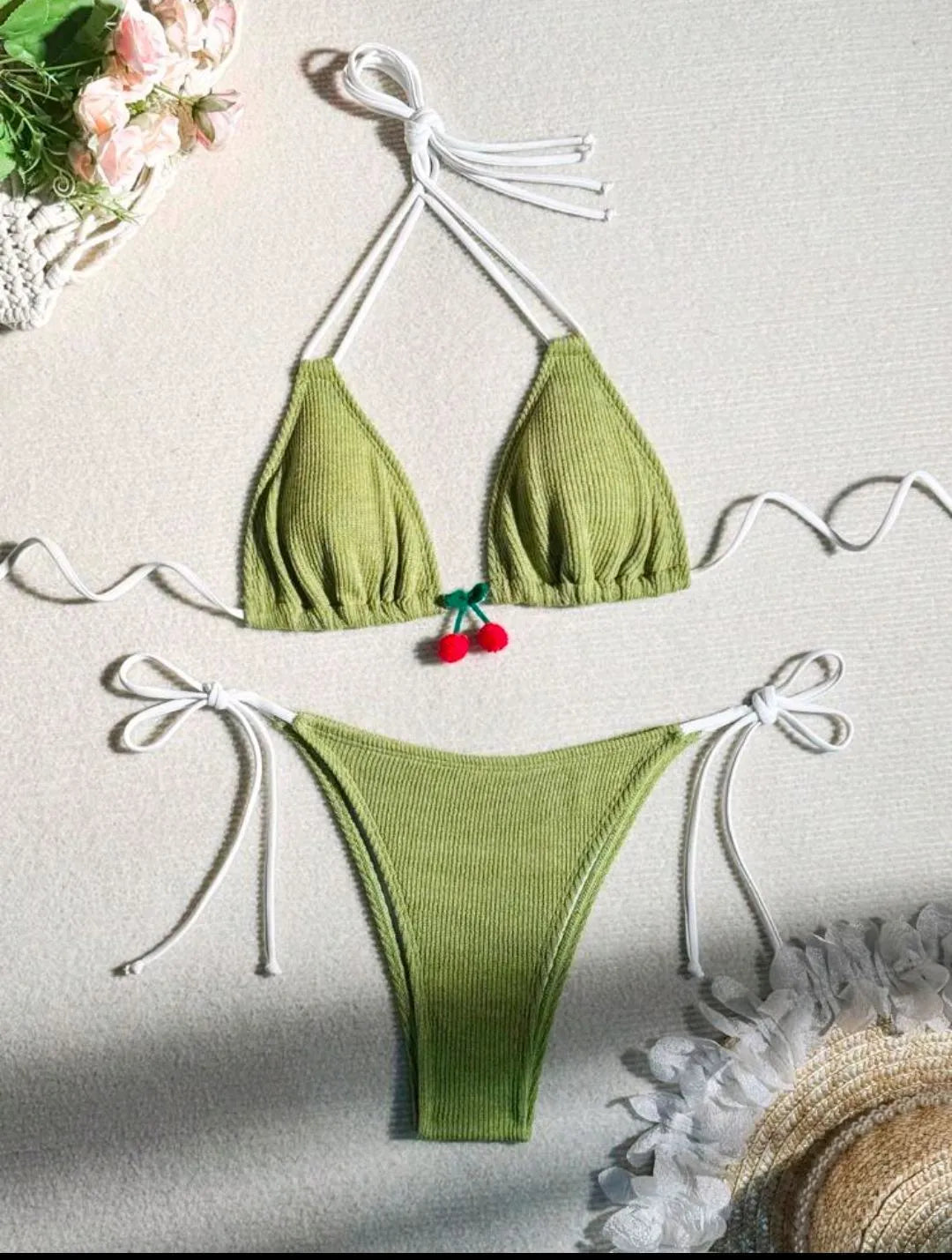 Women's sexy wind style bikini swimsuit in a solid colour, showing backless briefs design.