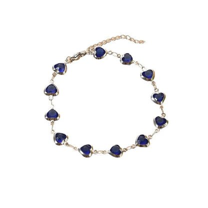 Devil's eye geometric heart bracelet in stainless steel showing colourful electroplated finish options.