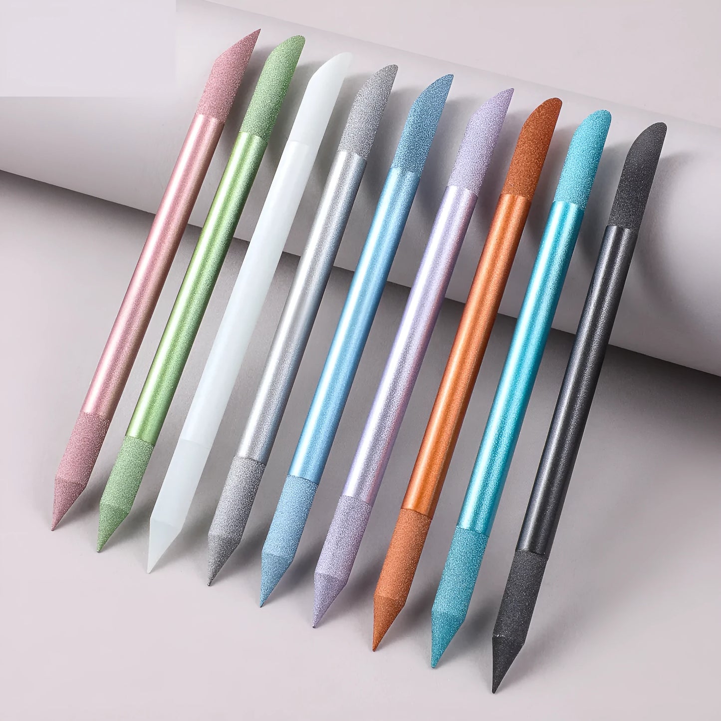 Nano glass nail polishing frotton tool in various solid colours.