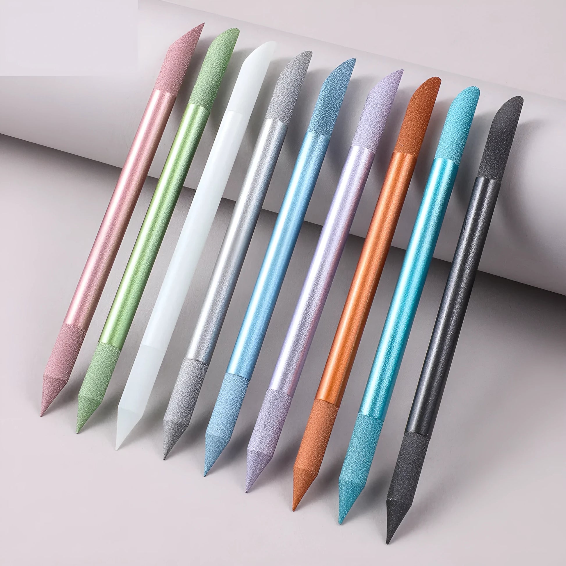 Nano glass nail polishing frotton tool in various solid colours.
