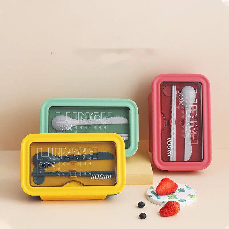 Green four-layer stacked plastic bento box with separate compartments for food, shown next to red and yellow options.
