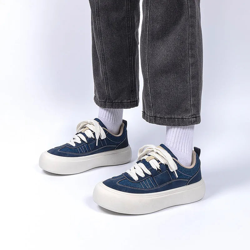 Men's platform casual shoes with raised sole in black colour showing round toe and lace-up front