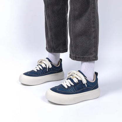 Men's platform casual shoes with raised sole in black colour showing round toe and lace-up front