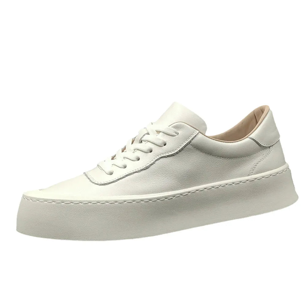 Men's white genuine cowhide board shoes with a thick rubber platform sole and round toe.