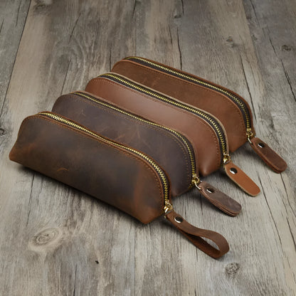 Square leather pencil case in genuine cowhide measuring 18cm with zipper closure