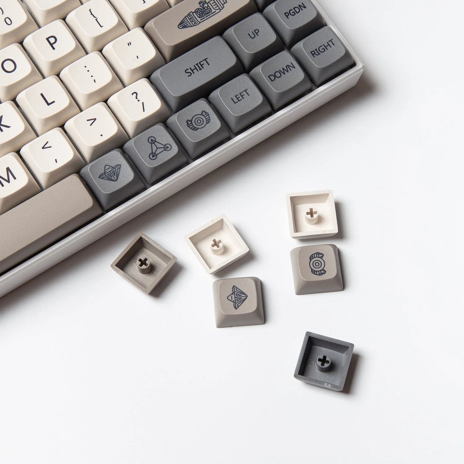 Complete set of 139 PBT XDA profile keycaps for mechanical keyboards with English legends laid out on a table.