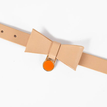 Brown leather cat collar shown on a white background.