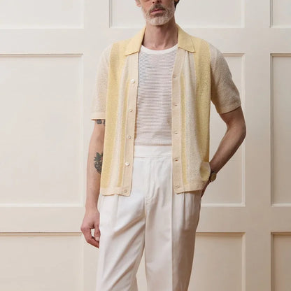 Yellow men's casual polo shirt with a hollow-out asymmetric design on the front.