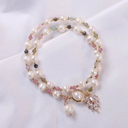 Red Cat's Eye Flower colour double-layer strawberry quartz crystal bracelet with lucky cat charm.