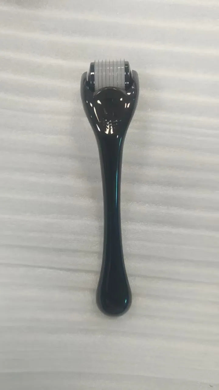 Sterile micro needle derma roller with black handle and coloured wheel on white background