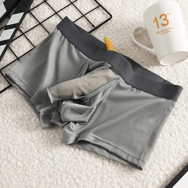 Men's ice silk boxer shorts in nylon mesh fabric showing low-waist design
