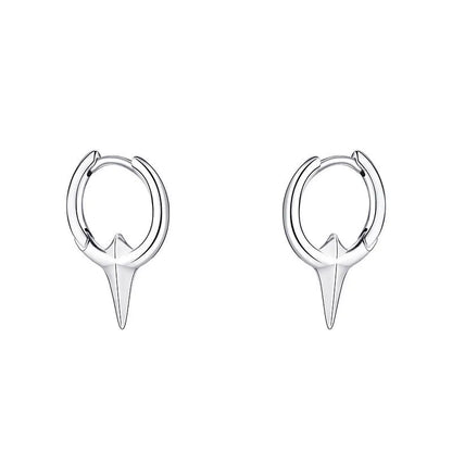 A pair of platinum-coloured star-shaped geometric ear clips for women with a copper white gold plated finish.