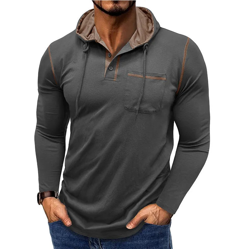 Man wearing a grey hooded henley long-sleeved t-shirt, showcasing the pullover style and cotton blend fabric.