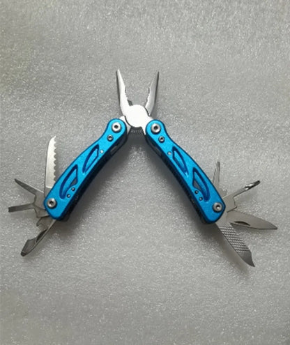 Blue foldable multi-function outdoor pliers with fruit knife tool next to Oxford carrying bag