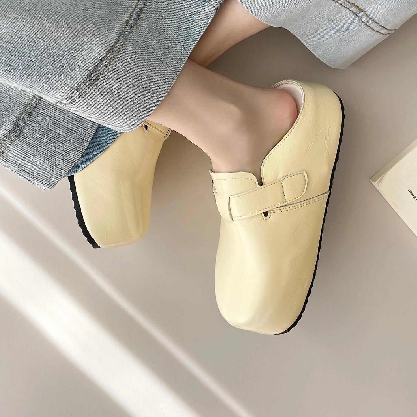 Flat buckle casual sneakers in yellow with round toe and PU upper