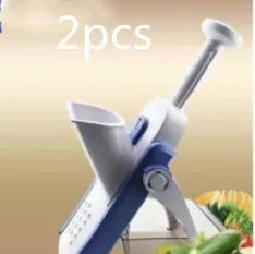 Orange multifunctional vegetable cutter kitchen tool with mandoline blades on a countertop.