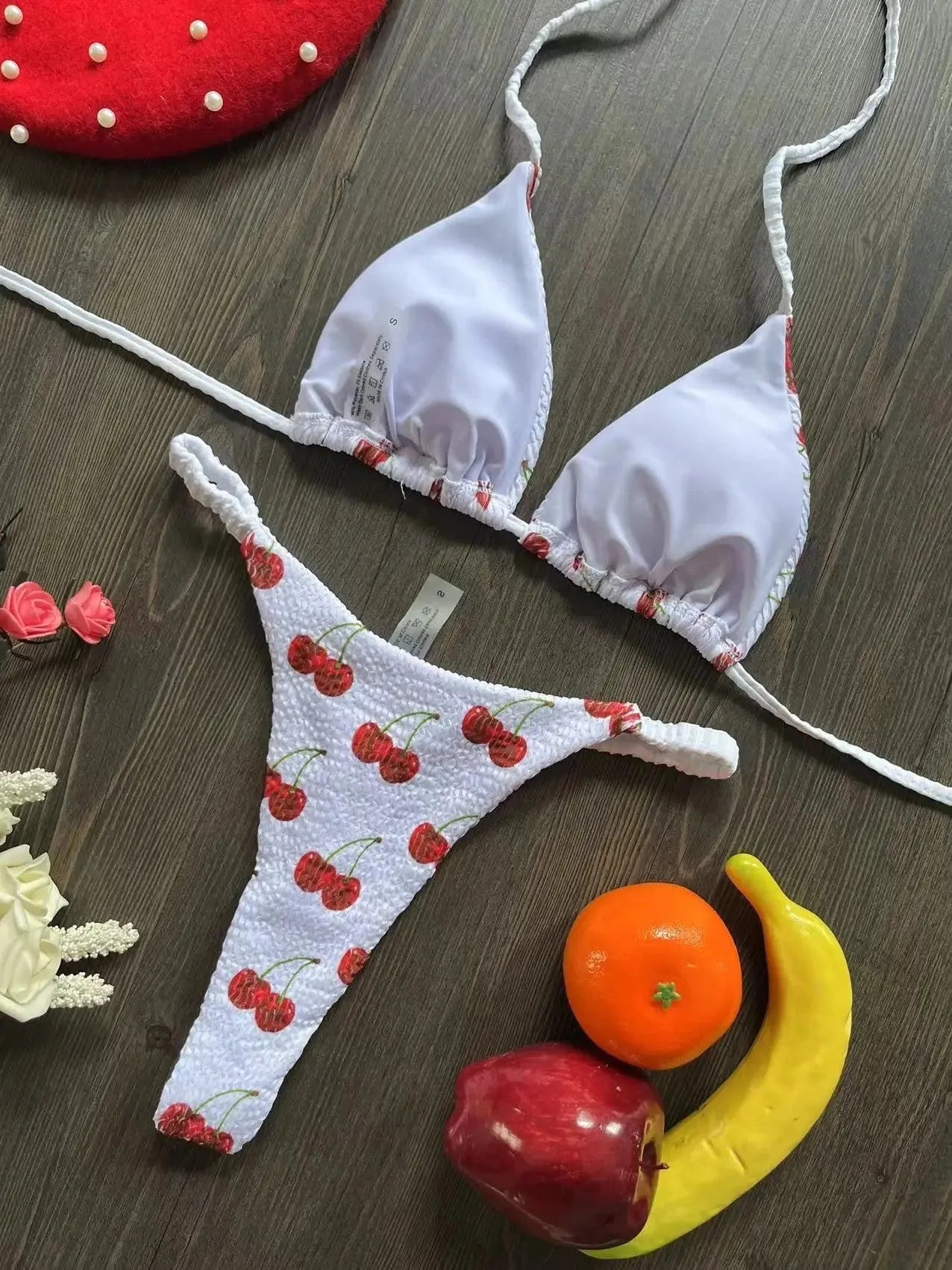 Women's printed two-piece bikini swimsuit with quick-dry fabric and cotton lining.