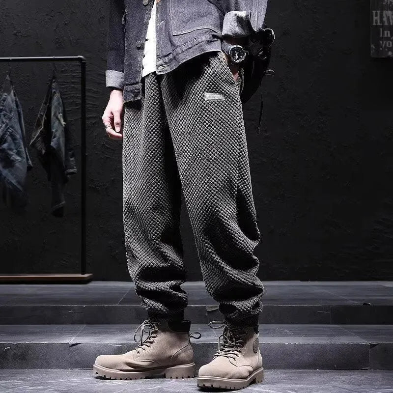 Men's grey ankle-tied sweatpants with straight leg cut and non-ironing fabric