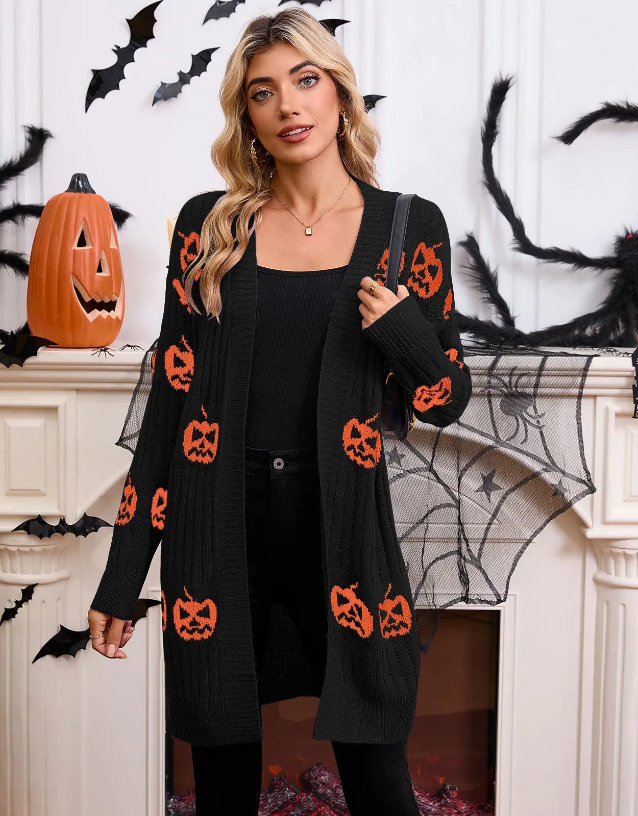 Women's black Halloween cardigan with orange pumpkin head jacquard pattern, regular sleeves, medium 65cm length