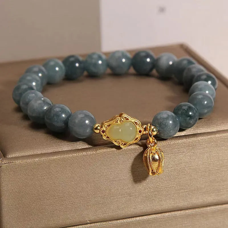Women's natural stone bracelet with sky blue carved gourd and lotus pendant
