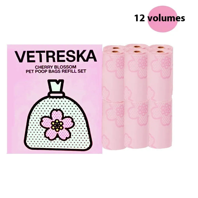 Dog poo bag dispenser capsule with roll of scented waste bags in strawberry, orange, or cherry blossom options