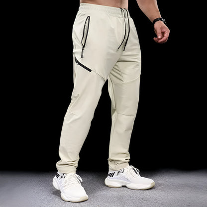 Men's waterproof quick-drying nylon workout trousers in multiple colour options