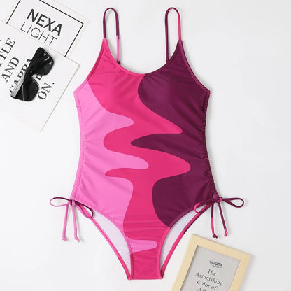 Women's sleeveless one-piece swimsuit in a striped print, shown in blue colour.