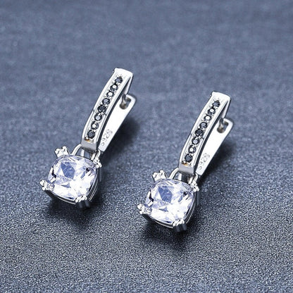 Copper-plated square zircon earrings with black inlay, modern geometric design