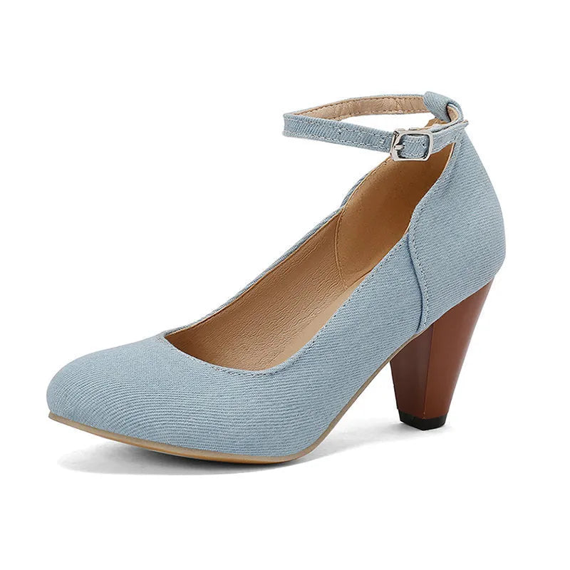 Women's blue denim platform heels with buckle closure and waterproof sole