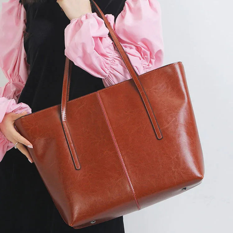Genuine leather women's shoulder bag in retro style with multiple internal compartments and slit outer pocket