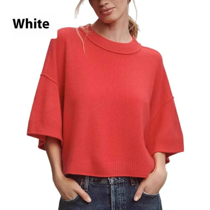 Women's red short sleeve viscose T-shirt with an exposed navel cropped design on a model.