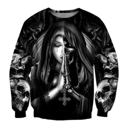 A black hooded sweatshirt with a large white and grey 3D printed skull graphic on the front, featuring long sleeves and a drawstring hood.