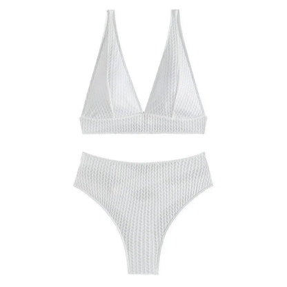 White women's backless bikini swimsuit with brief cut, laid flat showing bra and panties.