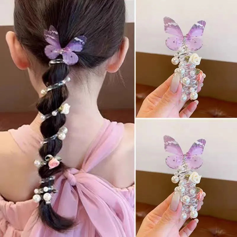 Colourful butterfly and pearl elastic hair band for children on a white background.