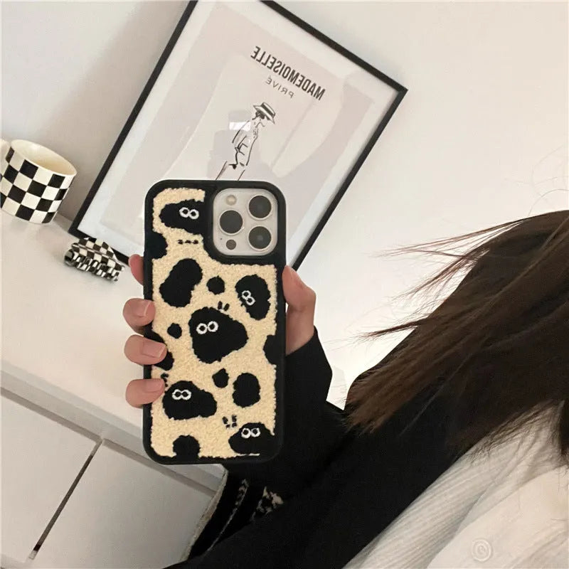 Black plush fairy design phone back cover for iPhone models including 13 Pro Max and 12 Pro.