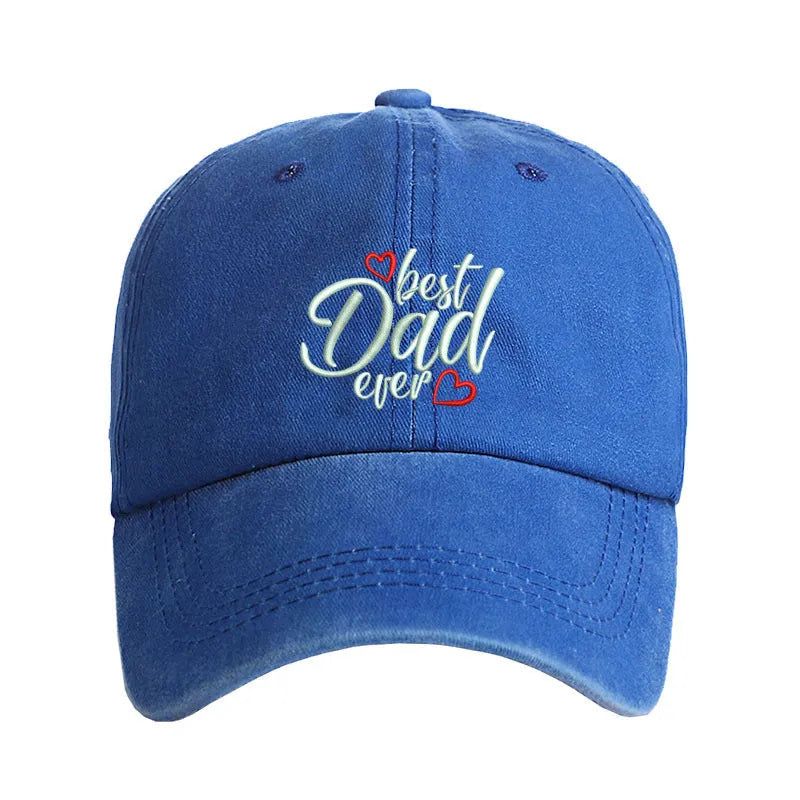 Washed cotton baseball cap with embroidered letters on dome crown, shown in adjustable fit.