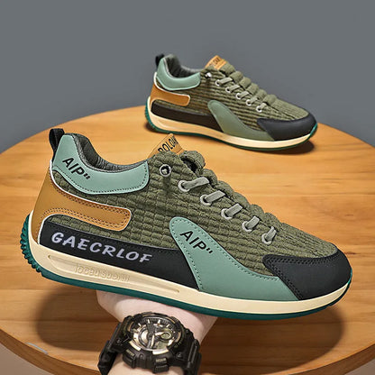 Men's green and grey mesh running shoes with round toe and lace-up closure