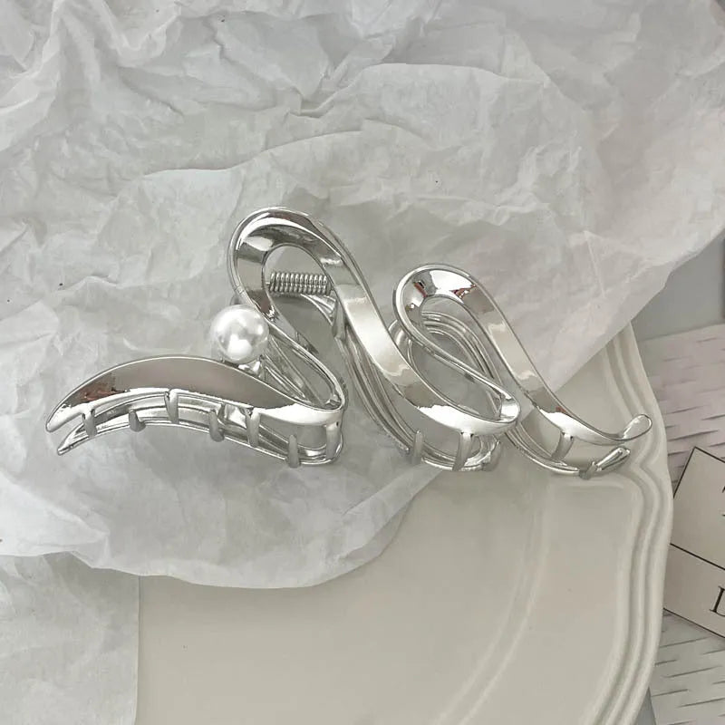 Silver metal hair claw barrette example from a range of 44 Korean-style designs.