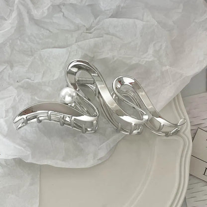 Silver metal hair claw barrette example from a range of 44 Korean-style designs.