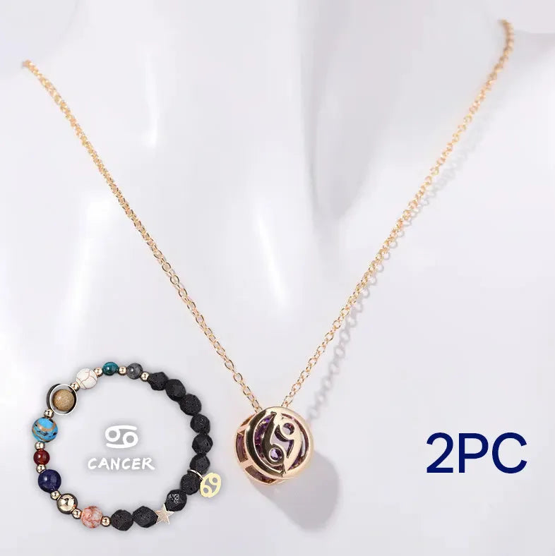 A natural stone beaded necklace and matching bracelet set laid flat, showcasing varied bead colours and textures.