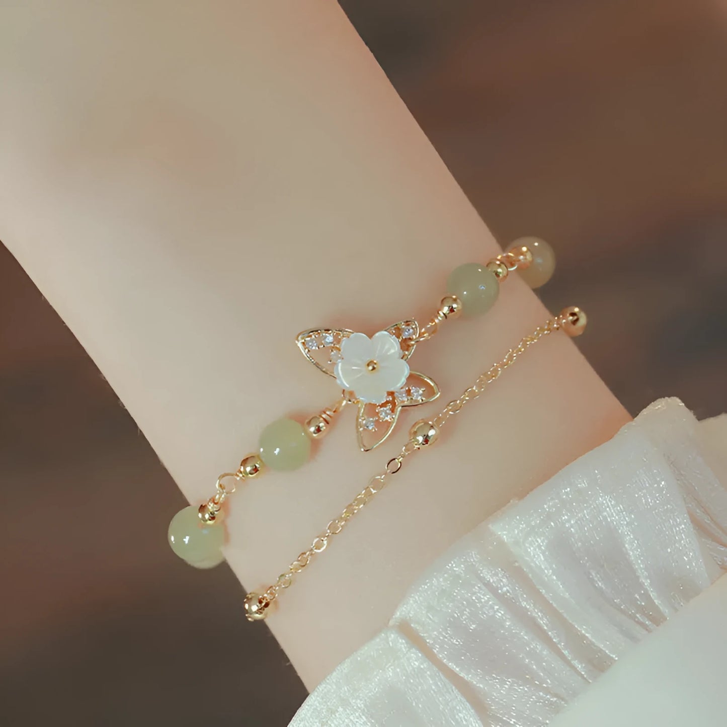 Yellow gold electroplated copper butterfly bracelet with geometric shapes for women