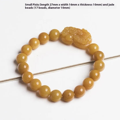Carved jinsi jade money bracelet in golden thread colour with jade bead detailing