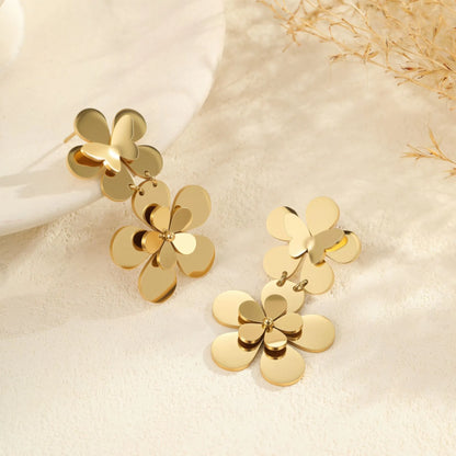 Gold colour flower butterfly stainless steel earrings for women with geometric and zodiac design elements