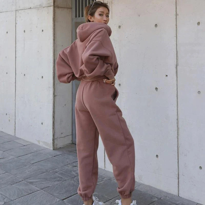 Women's polyester hoodie jacket and sports pants set in various colors for casual and athletic wear