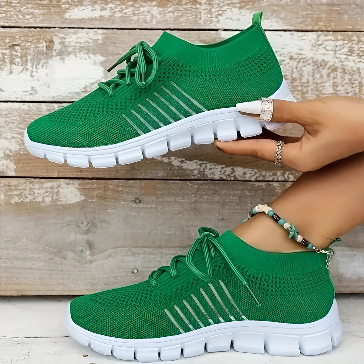 Women's flying knit casual flats with mesh upper, round toe, and front-tie design in multiple colour options