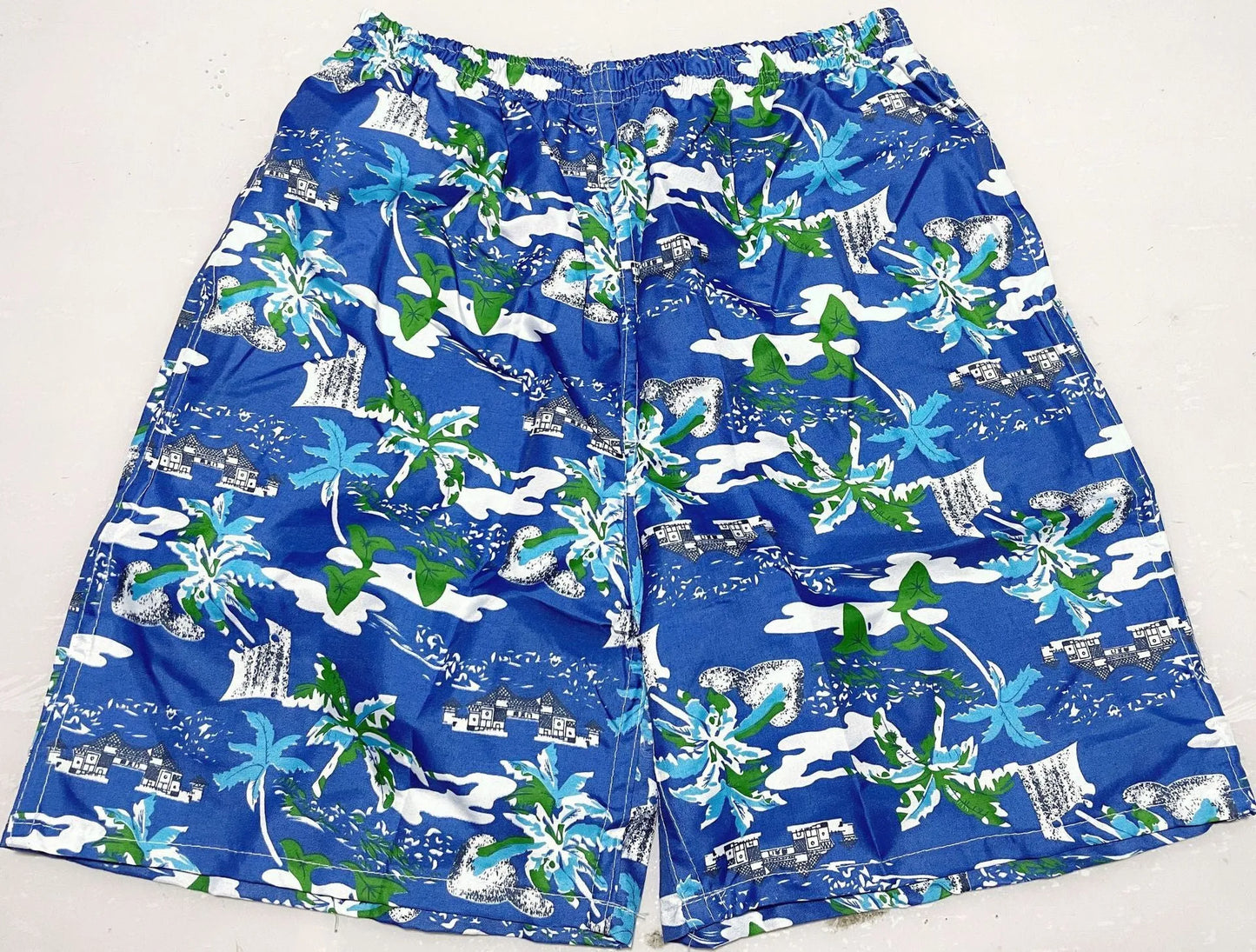 Men's floral patterned swim shorts with five-point cut design