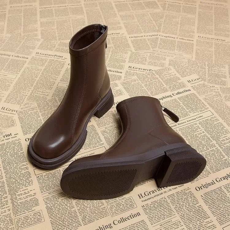 Women's black flat heel ankle boots with back zipper and round toe